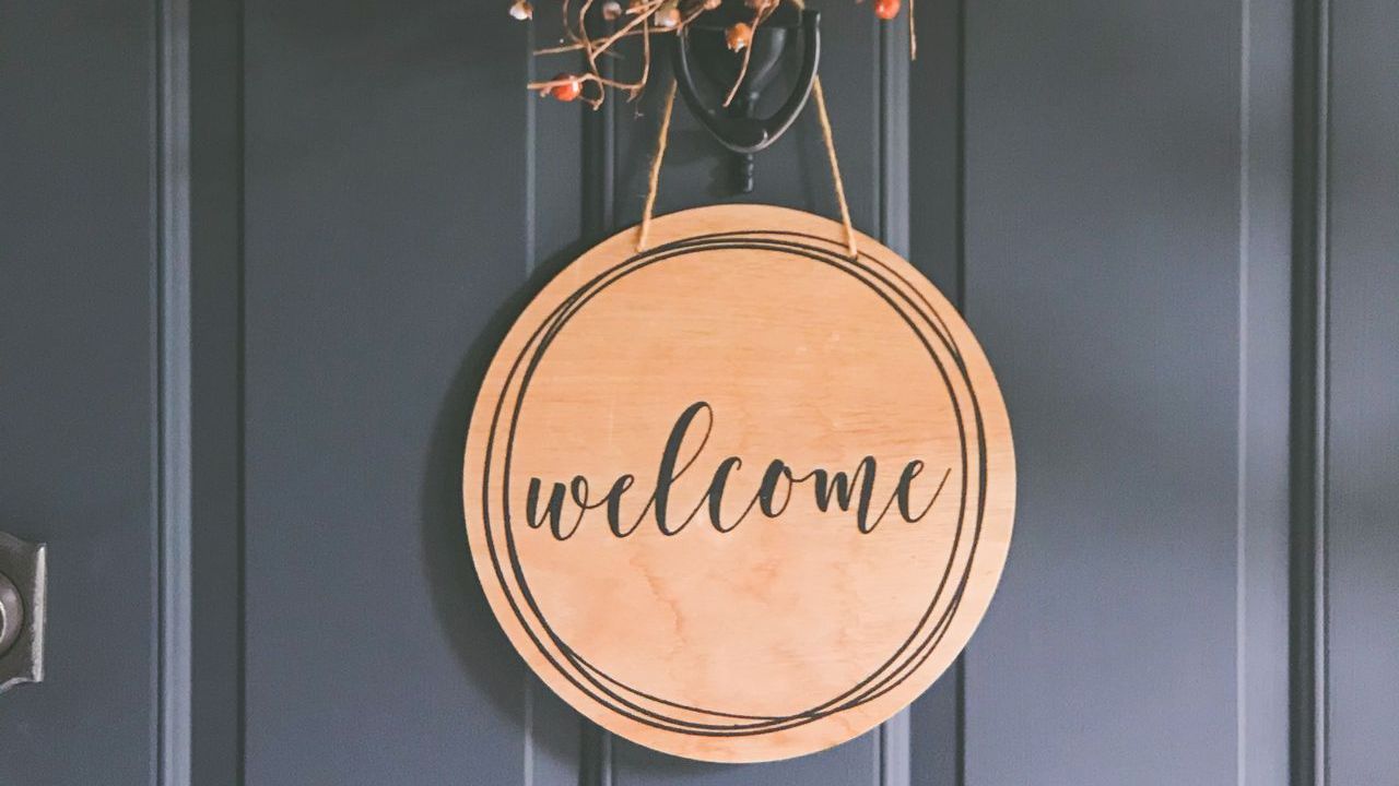 Welcome sign on the door